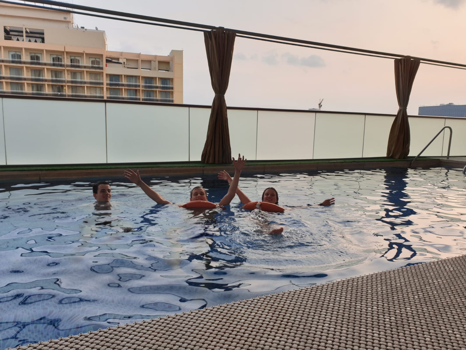 Jumping in the pool at doha hotel